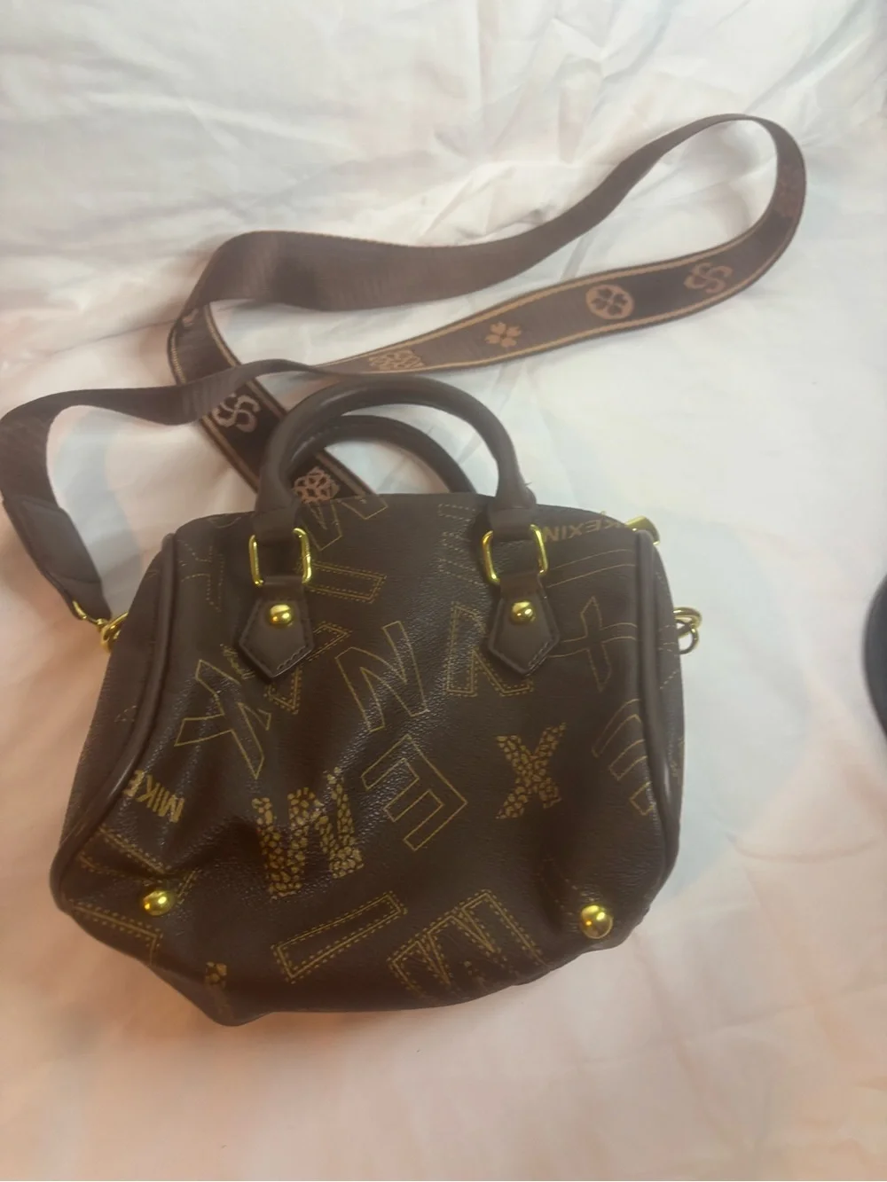 Luxury-Inspired Brown Pattern Satchel with Gold Accents